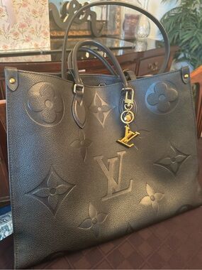 Louis Vuitton Black Embossed Monogram OnTheGo Tote with Gold Charm